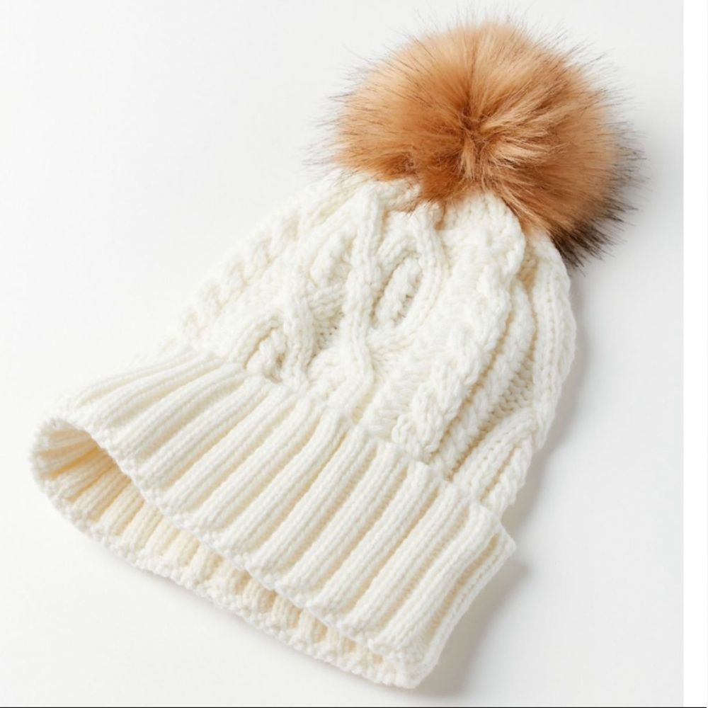Urban Outfitters cable knit pompom beanie.